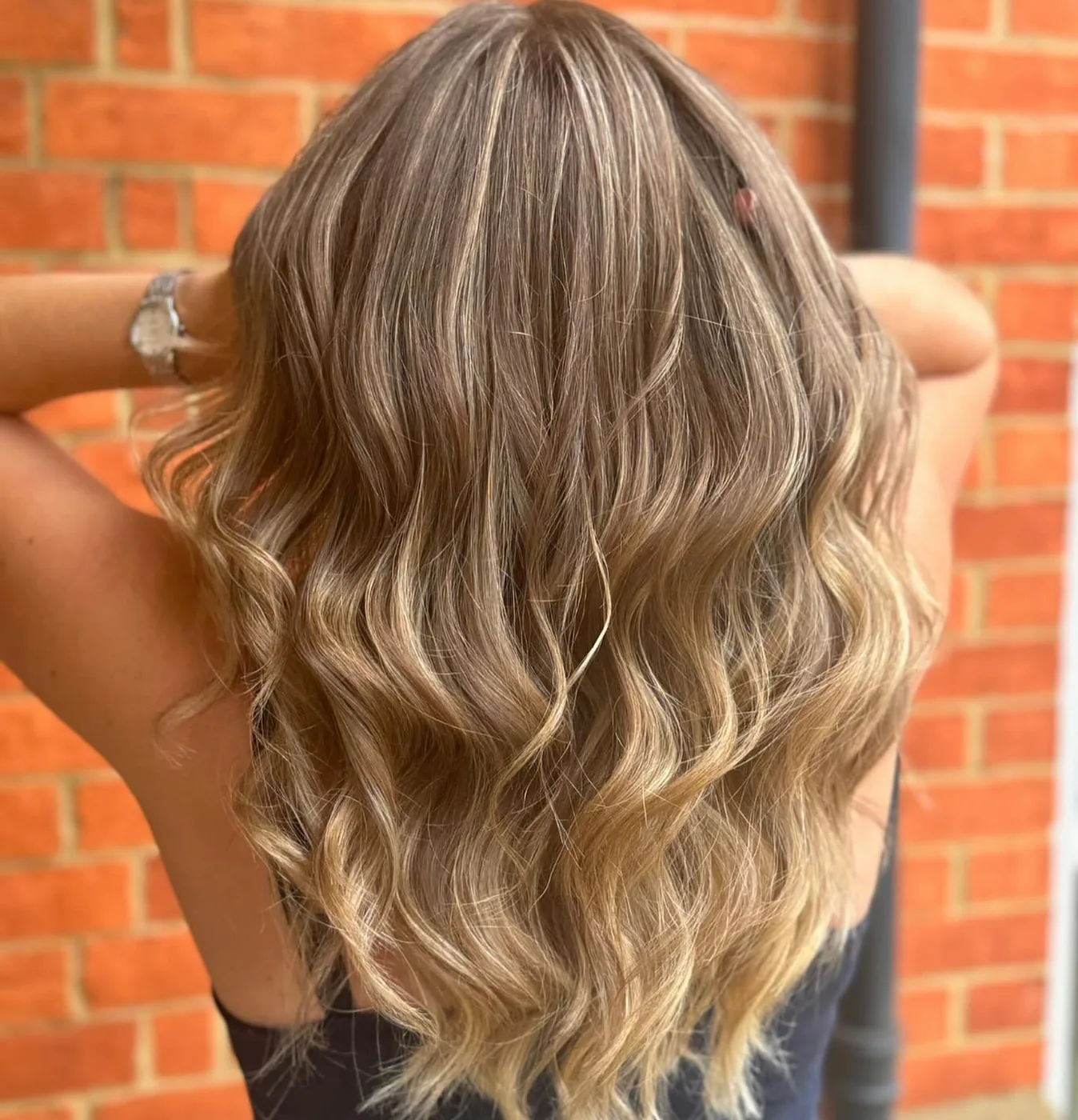 Long blonde balayage with soft waves